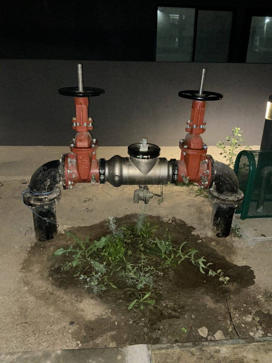 Reduced-pressure backflow assembly being tested and certified
