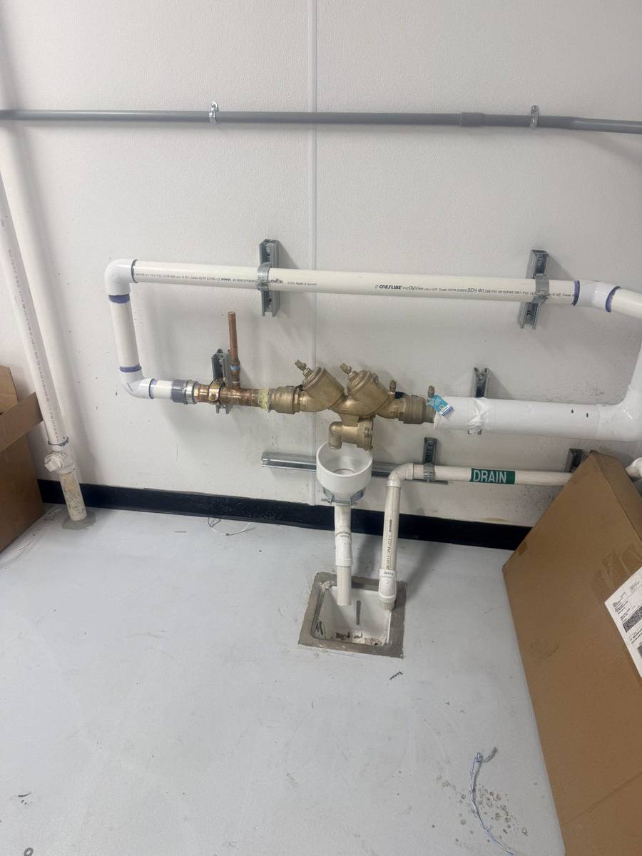 Backflow device gauge test during a certification visit