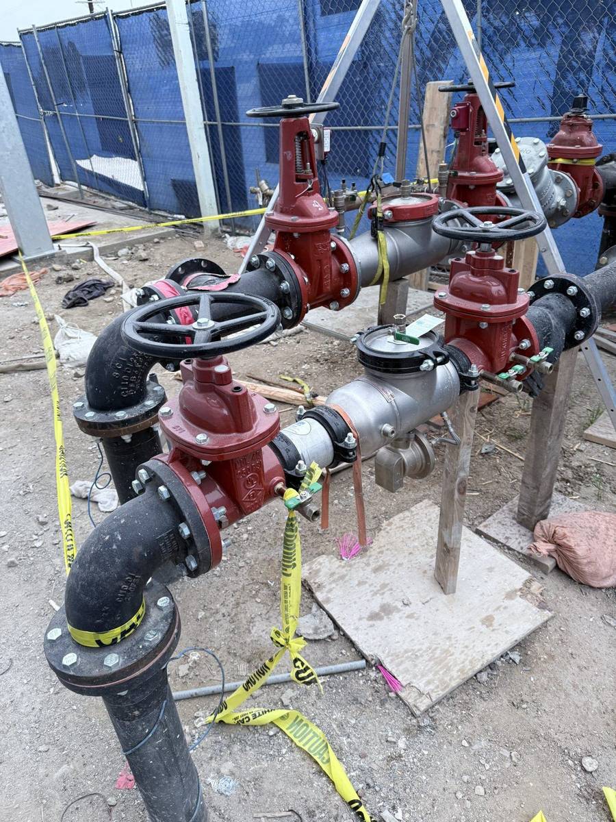 Technician performing an annual backflow prevention test