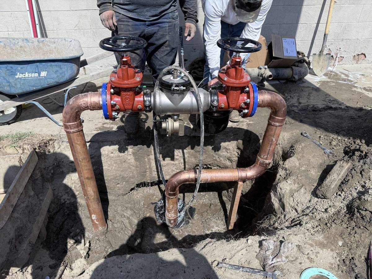 Reduced-pressure backflow assembly being tested and certified