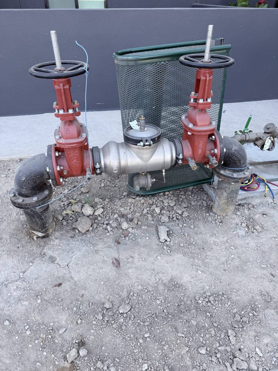 Technician performing an annual backflow prevention test