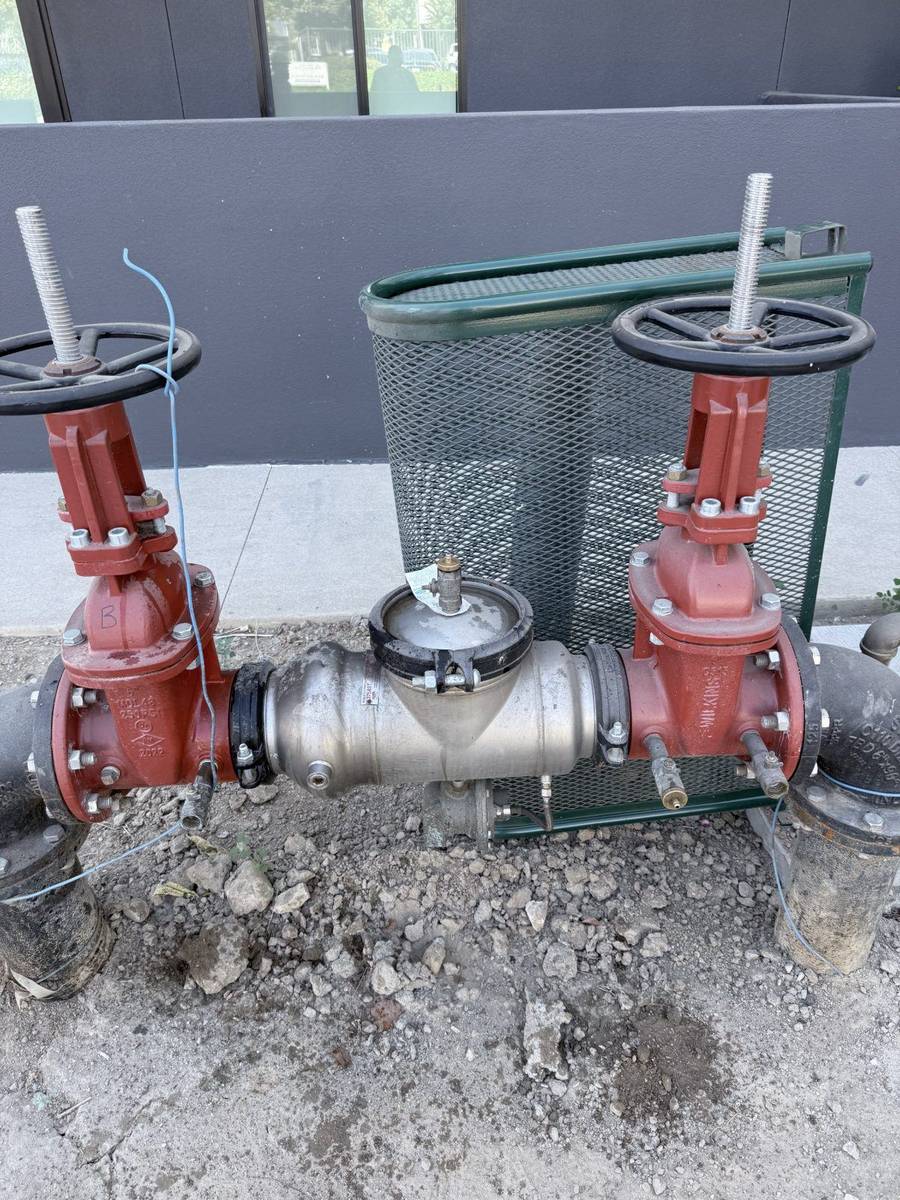 Reduced-pressure backflow assembly being tested and certified